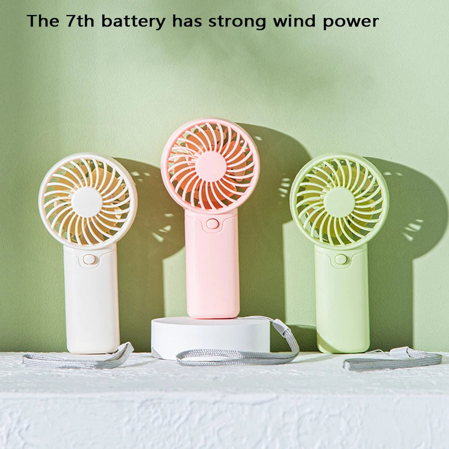 Small Fan + Handheld + Portable with Wrist Strap + Requires AAA Batteries + 1 Speed Setting + Cross-Border Bestseller